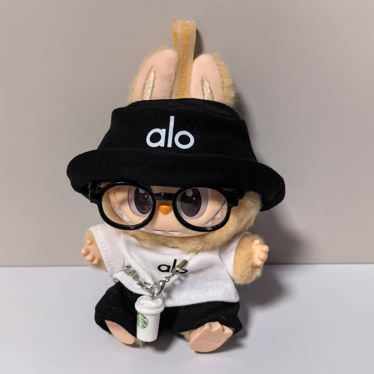 labubu alo outfit with starbucks charm