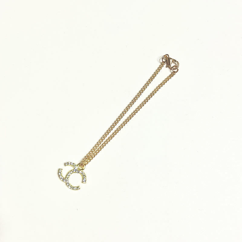 labubu necklace​ Chanel gold